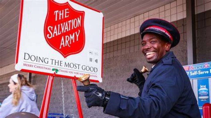 Elliott donating to The Salvation Army